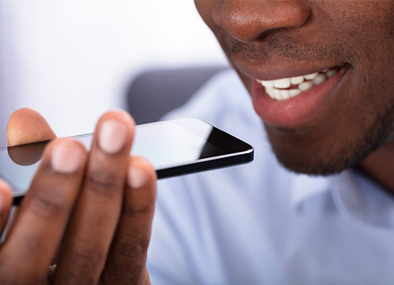 Man speaking to smartphone