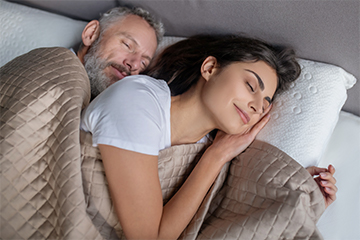 Getting rest Couple sleeping in bed